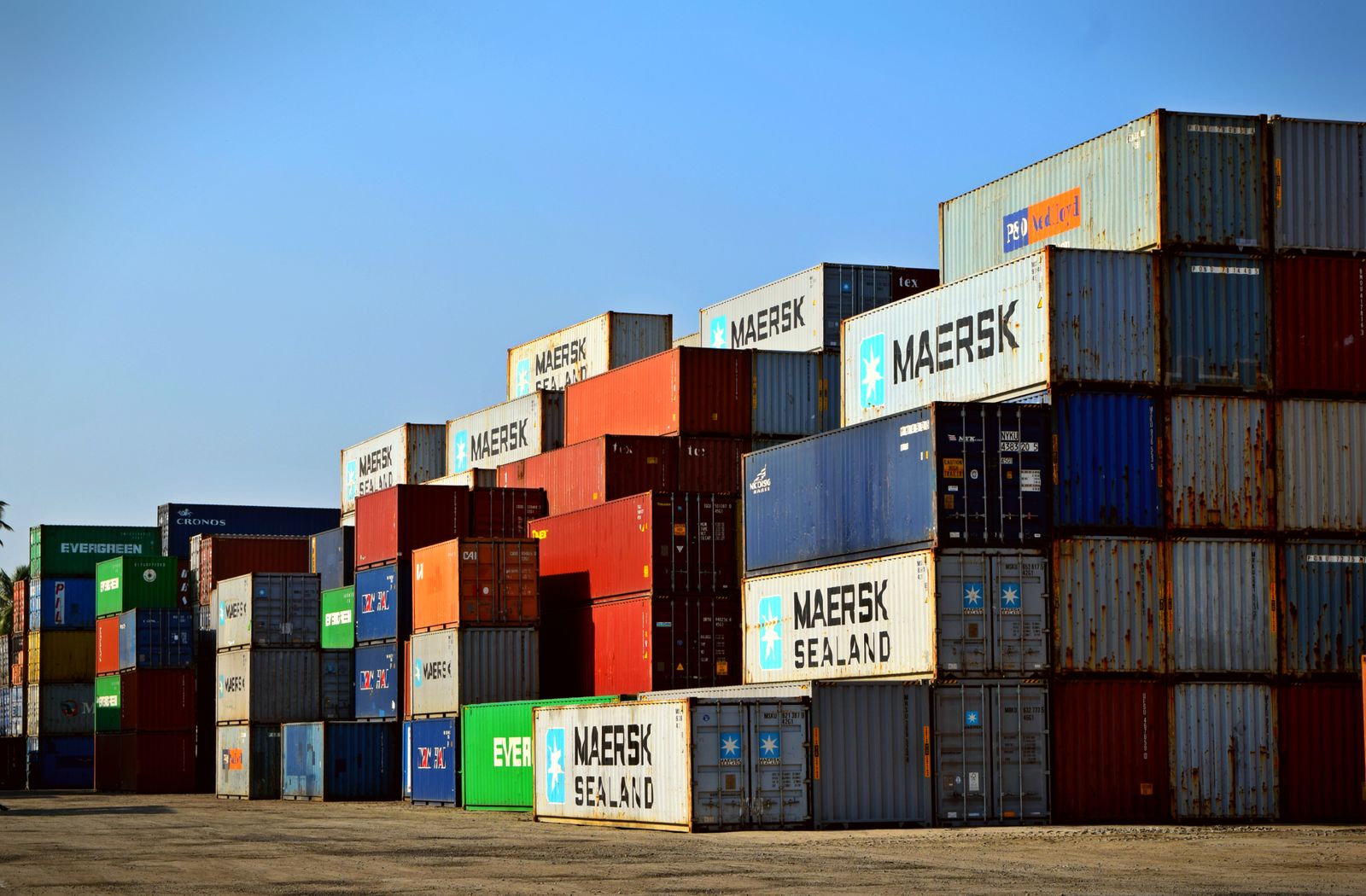Stacked shipping containers in a container yard